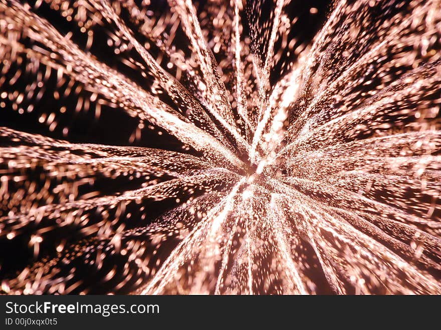 Time exposure photo of Fourth of July fireworks with the appearance of a star explosion in space, 3-D effect. Time exposure photo of Fourth of July fireworks with the appearance of a star explosion in space, 3-D effect.