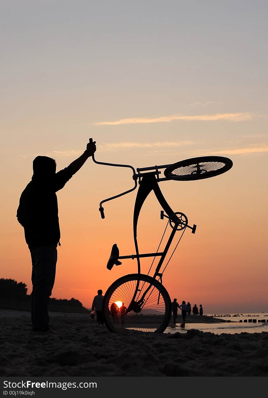 Bikers admiring sunrise during cloudy day