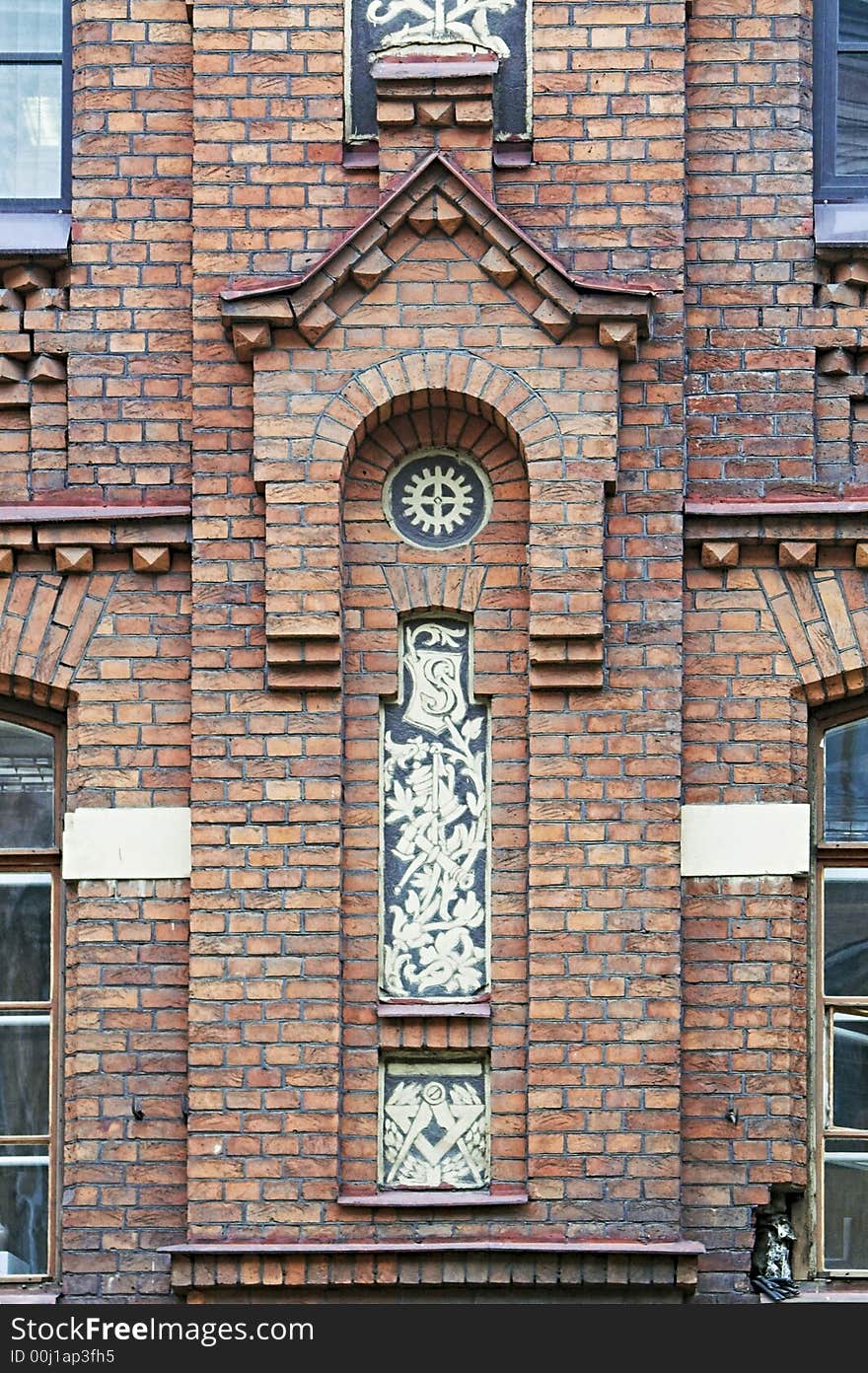 Ornamented Brick Facade of Old Building