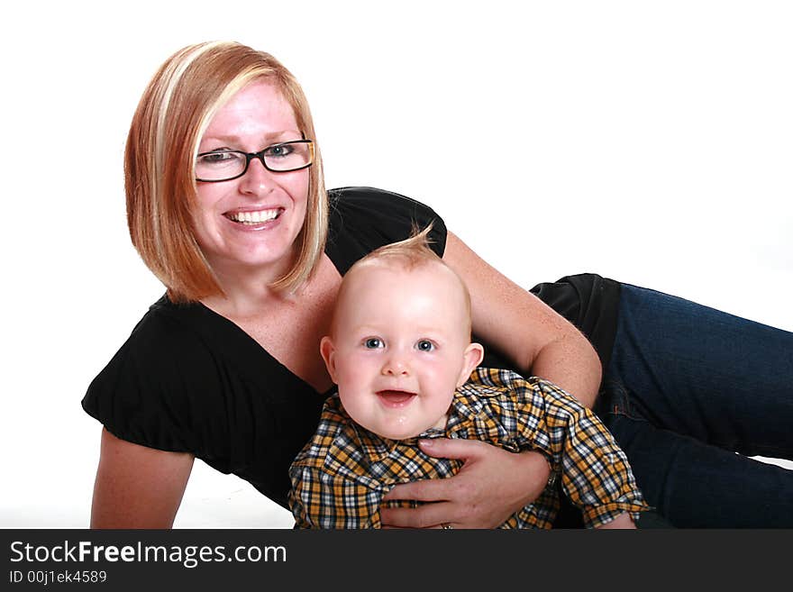 Mother and her baby son. The background is white. Mother and her baby son. The background is white.