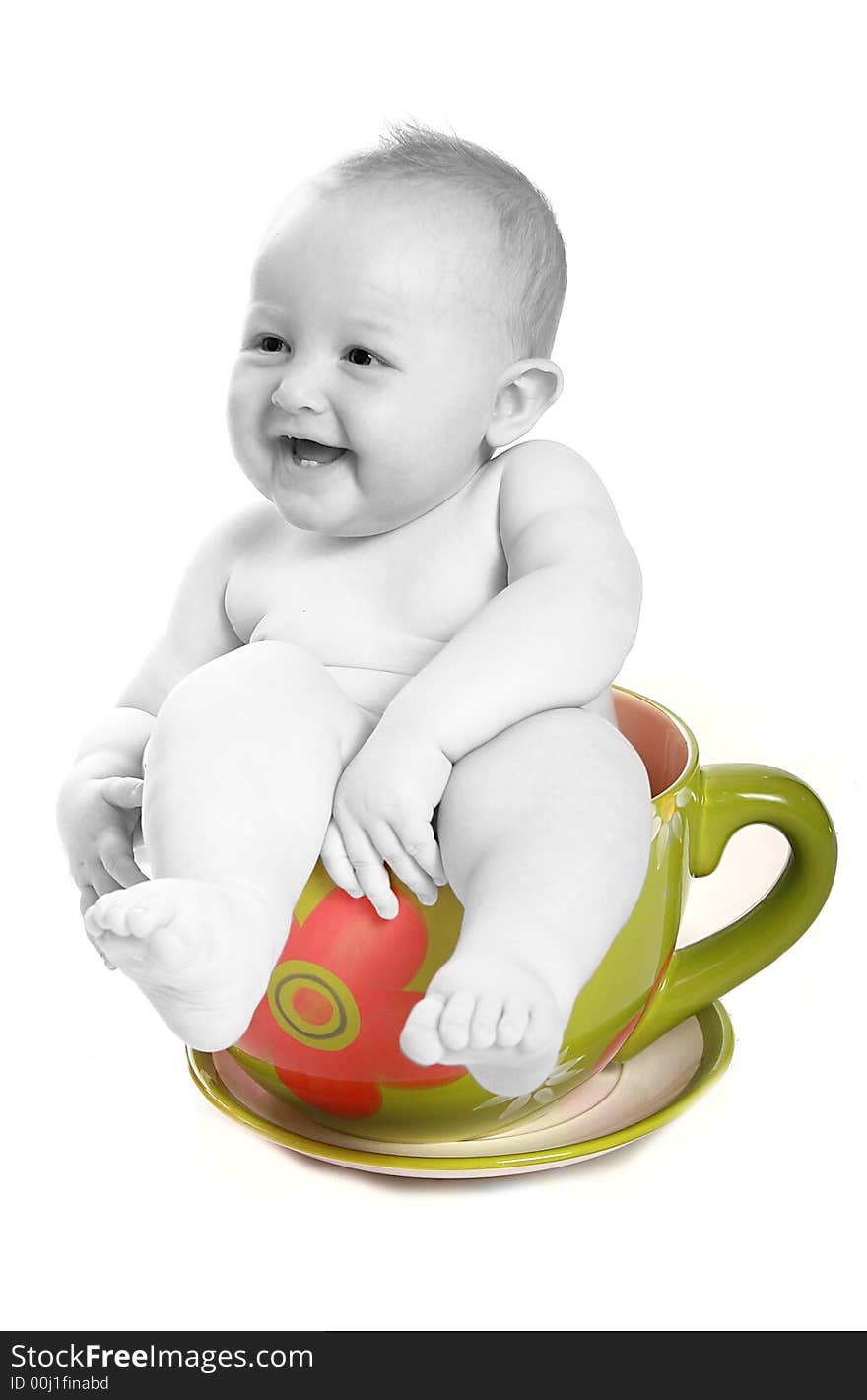 Baby in a big tea cup half colored and half black and white. Baby in a big tea cup half colored and half black and white.