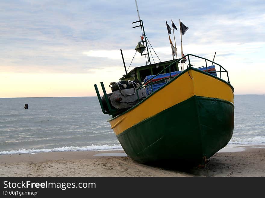 A Few Fishing Boats At The Baltic Sea at the sundown