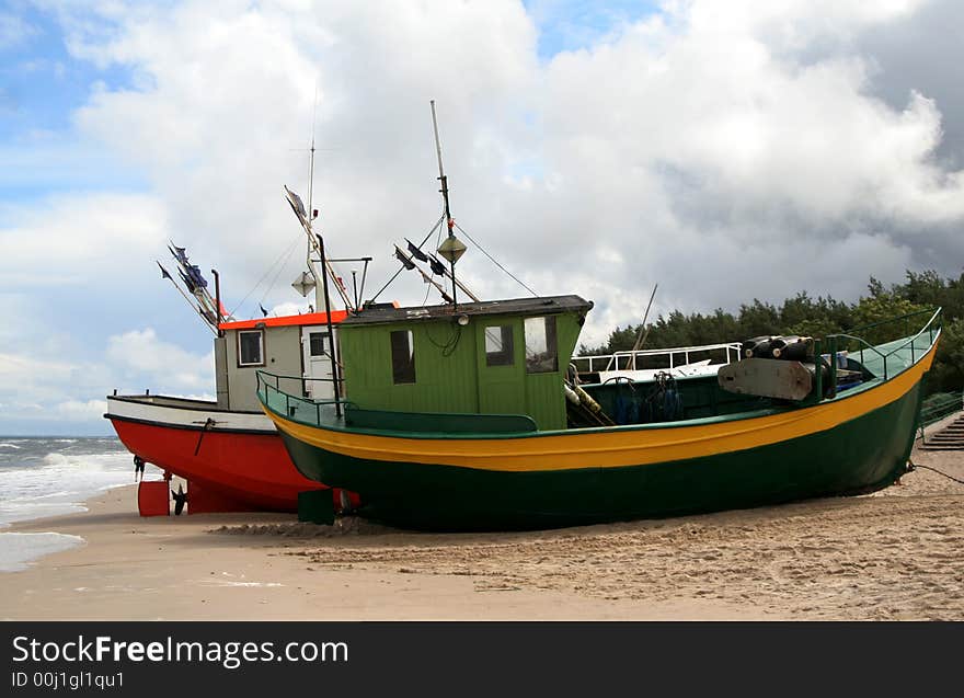 A Few Fishing Boats At The Baltic Sea at the sundown