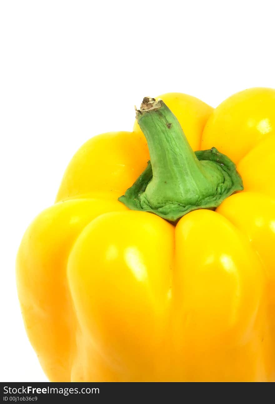 Colorful yellow paprika isolated on white background