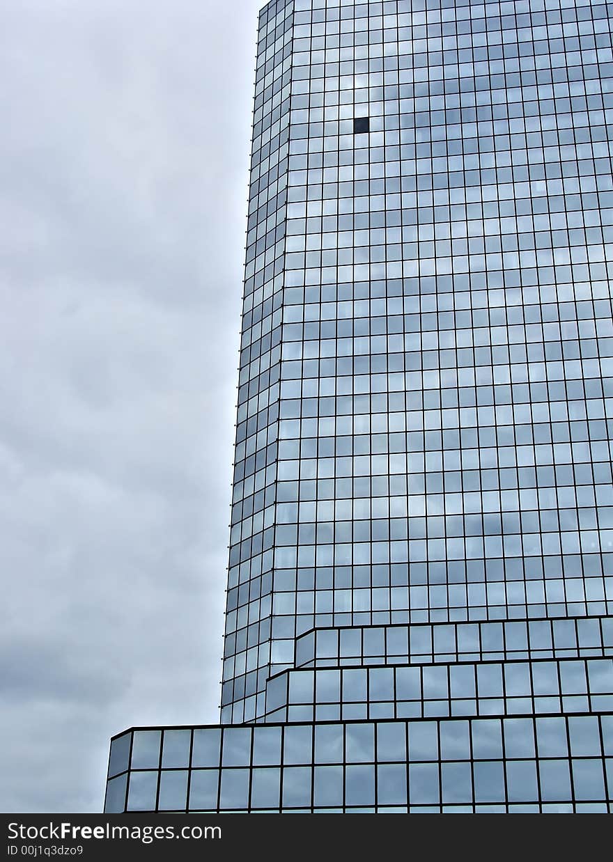 Blue glass skyscraper in the city of Warsaw in Poland. Blue glass skyscraper in the city of Warsaw in Poland