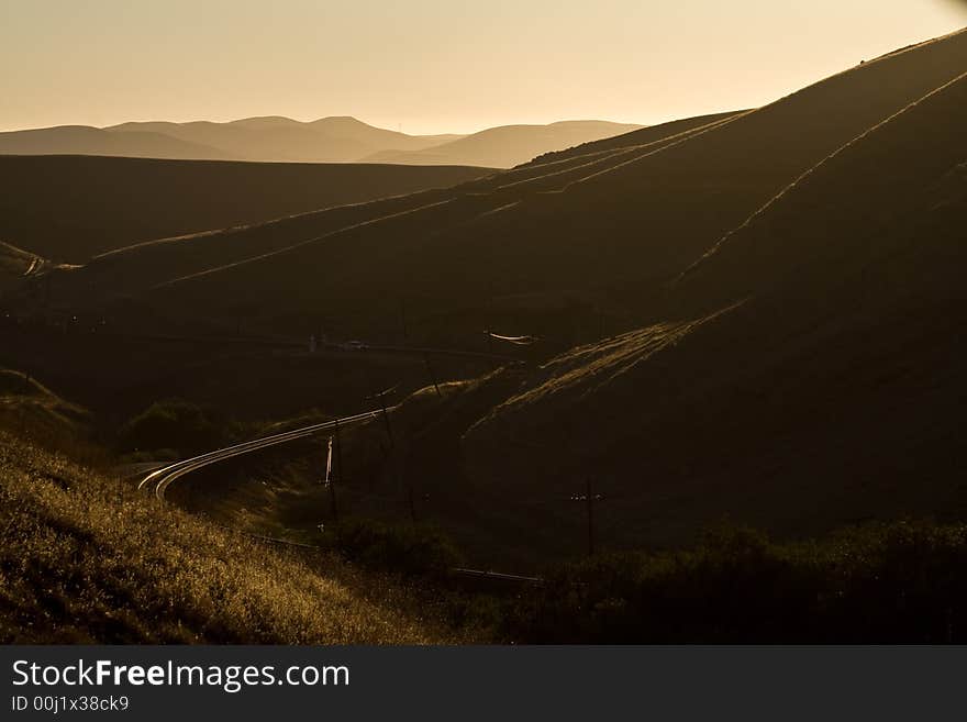 Rail road weaving its way through hills of Northern California. Rail road weaving its way through hills of Northern California