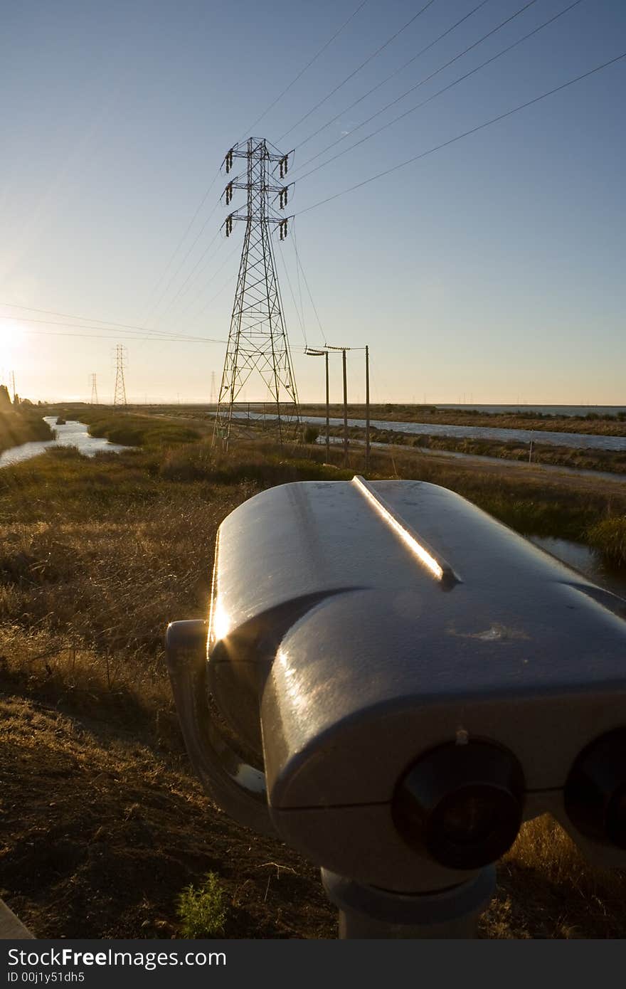 A view on the bay with power lines and binocular. A view on the bay with power lines and binocular