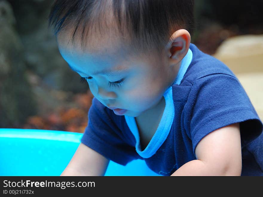 Child Playing in Water Activity Table. Child Playing in Water Activity Table