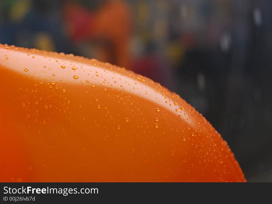 Colorful balloon and water droplets