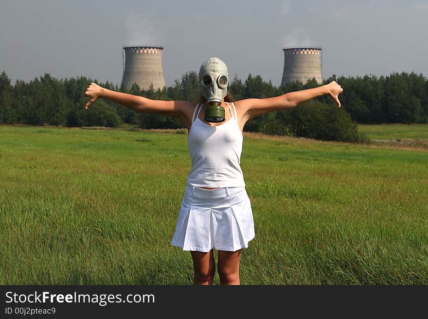 Girl in a gas mask and smoke pipes