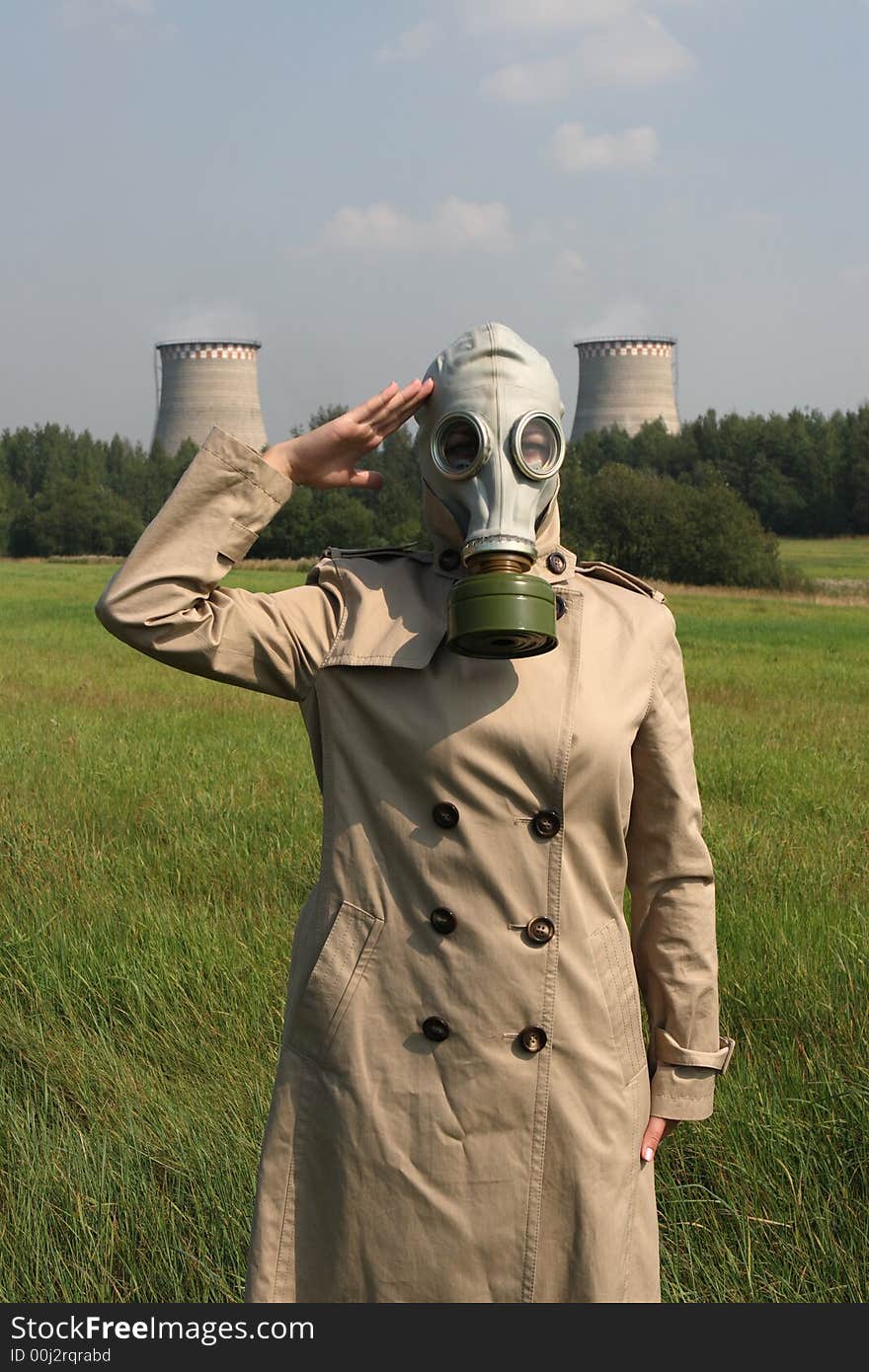 Girl in a gas mask and smoke pipes