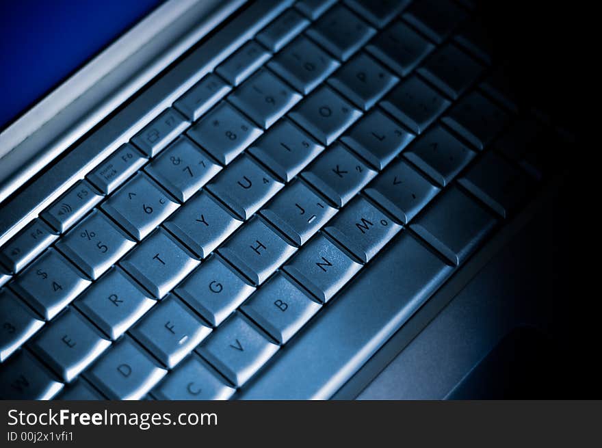 Macro shot of a laptop keyboard.