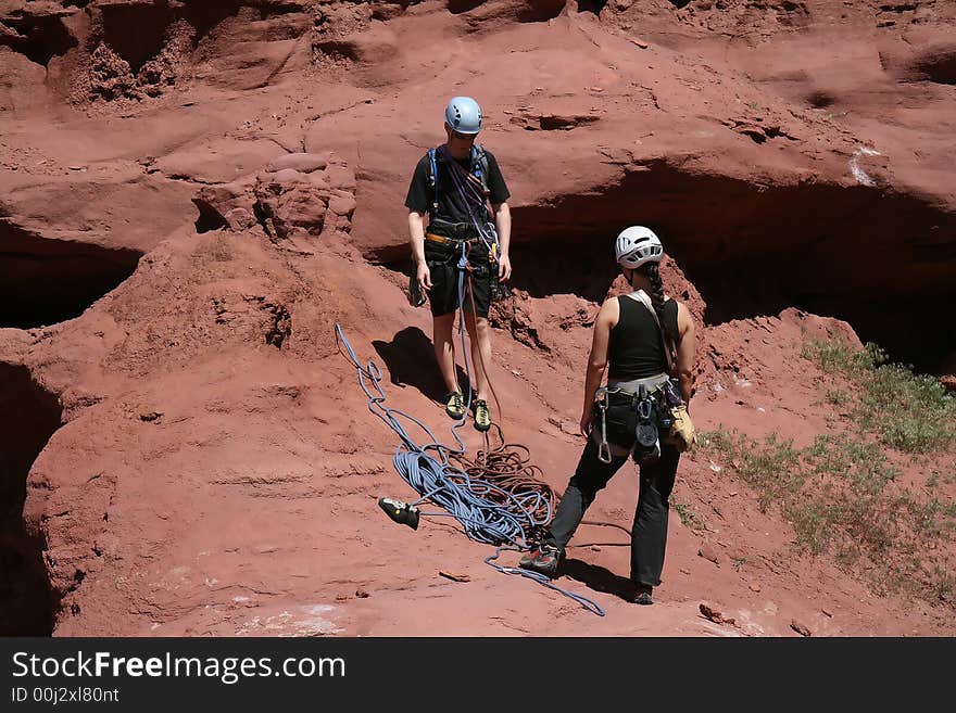 Two rock climbers thinking about the ascent @ Fisher Towers