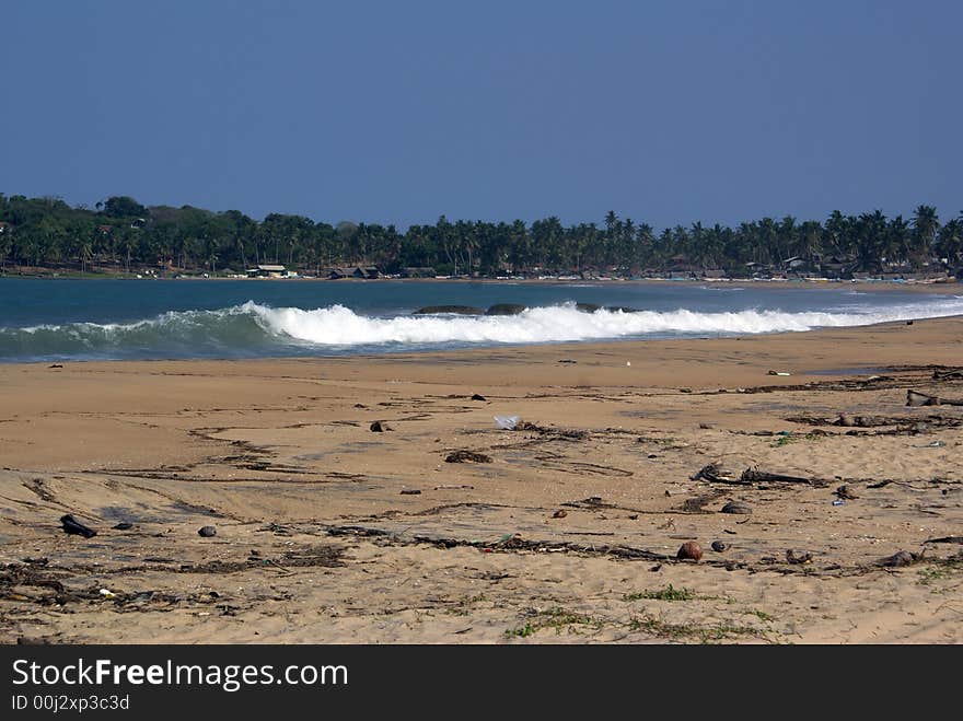 Wave on the beach Aguram Bay in Sri Lanka