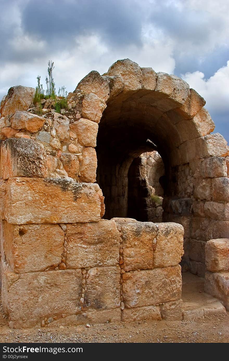 Arch overlapping of a tunnel for spectators in an antique amphitheater nearby Israel. Arch overlapping of a tunnel for spectators in an antique amphitheater nearby Israel