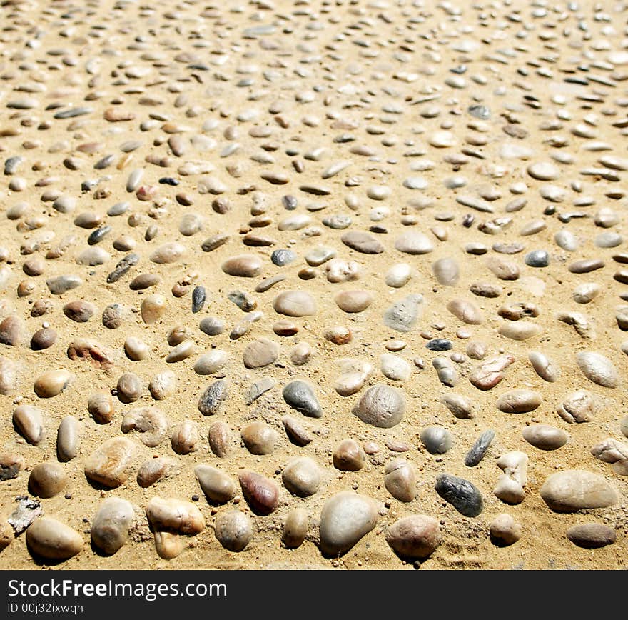 Stony texture with the sand base