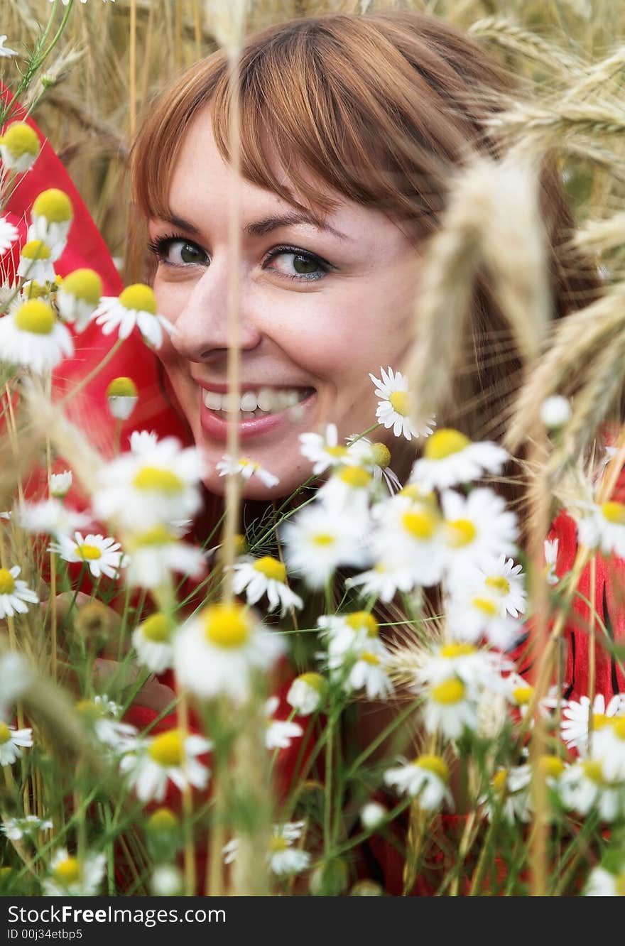 The girl and camomiles