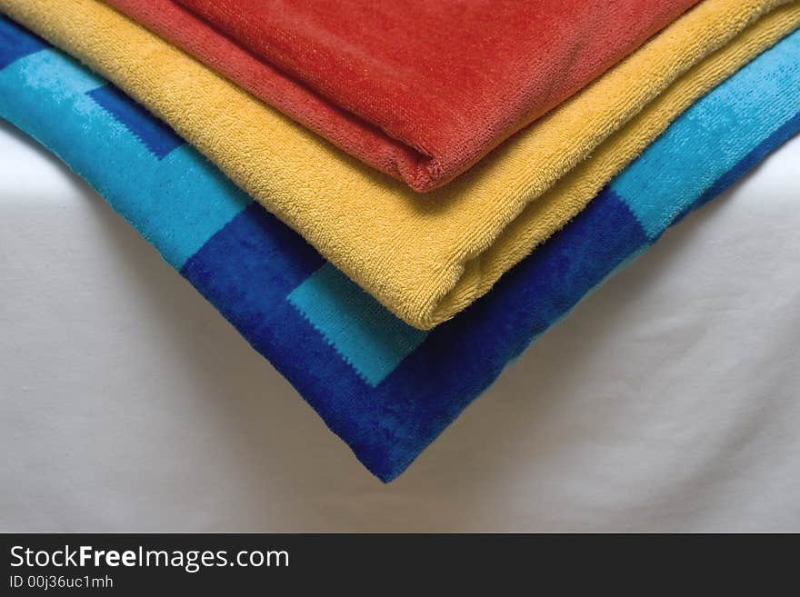 Colorful Vivid Towels on a Bed