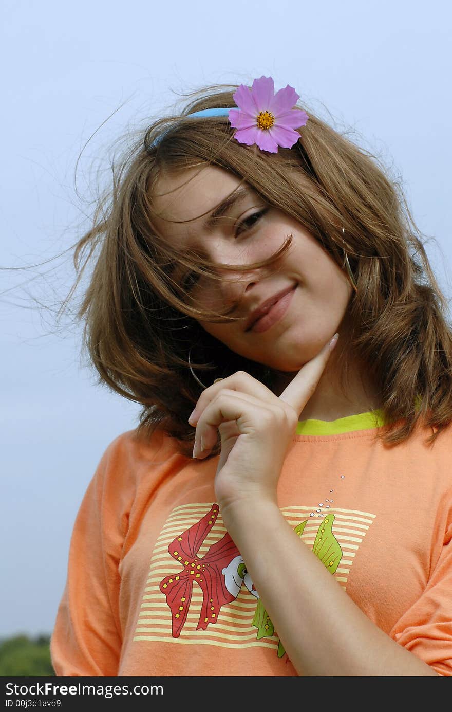 Girl with flower in a hair