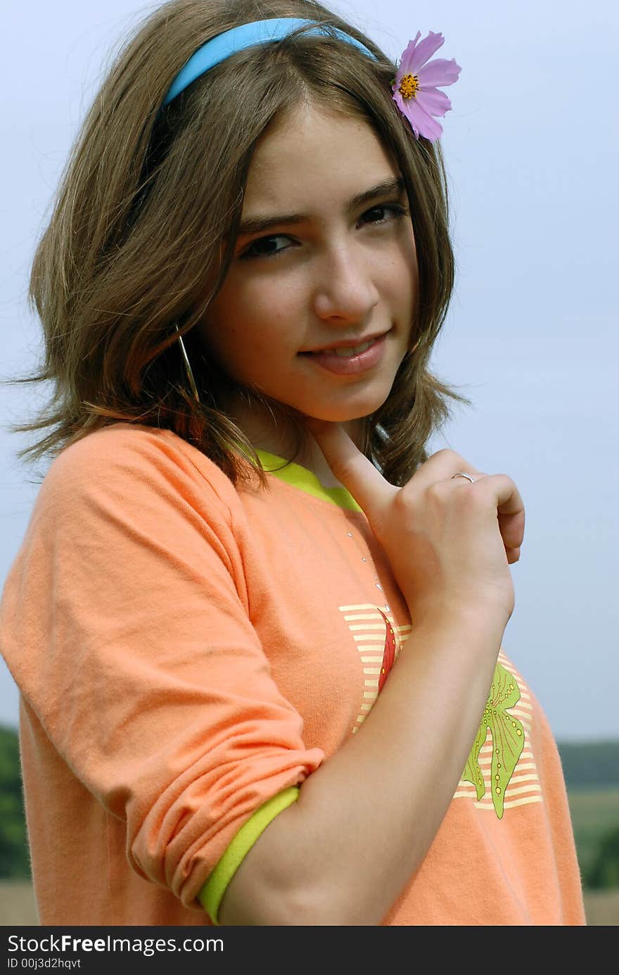 Girl with flower in a hair