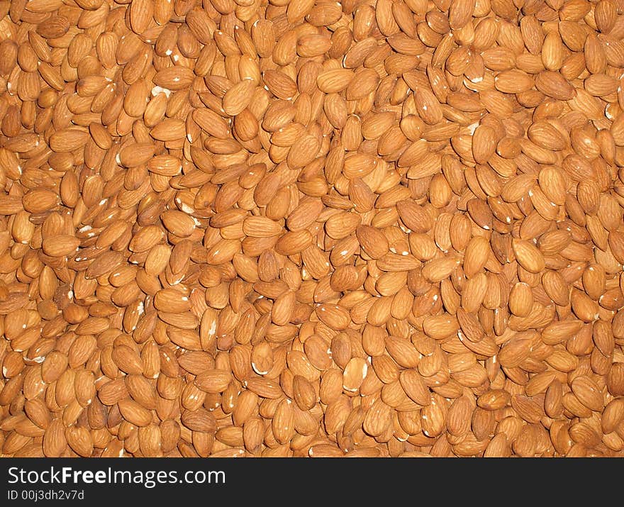 Background from appetizer brown almonds