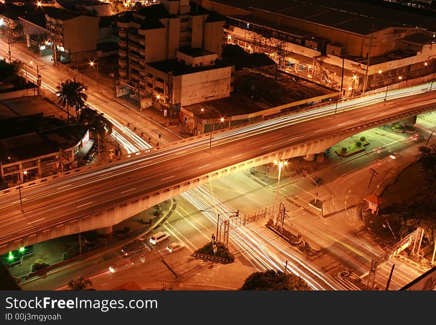 Intersection at night with light and motion blur