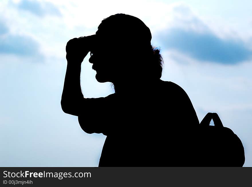 An image of tourist on background of sky. An image of tourist on background of sky