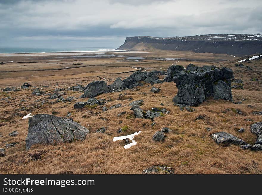 Icelandic landscape with rocks and grass