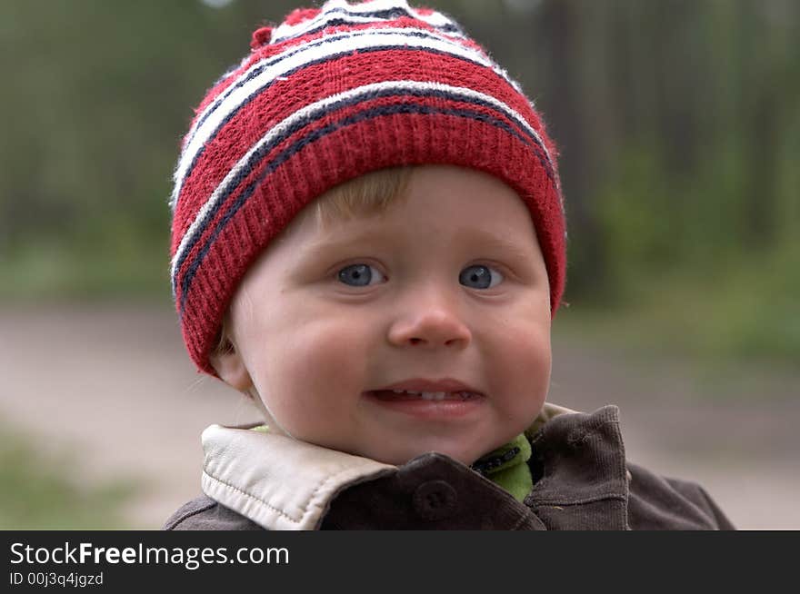 Portrait of the lovely child on fresh air