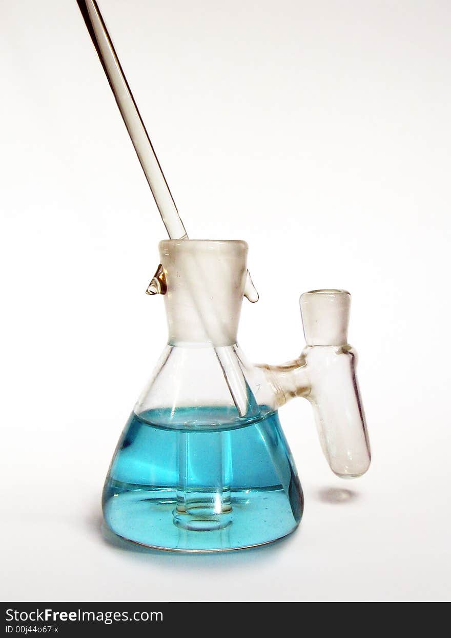 The test-tube with stick and blue liquid. The test-tube with stick and blue liquid