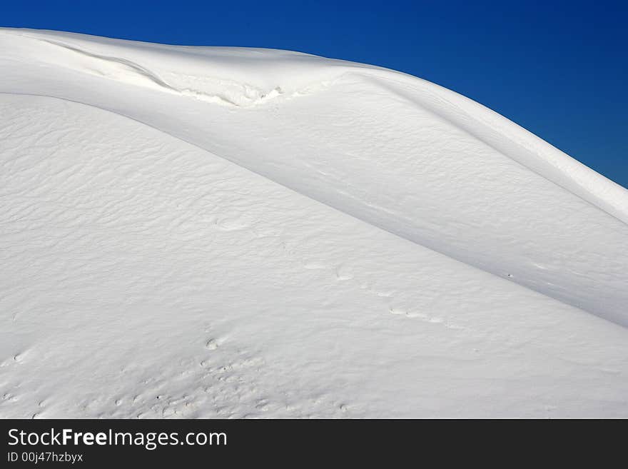 A small mountain created by fresh snow. A small mountain created by fresh snow