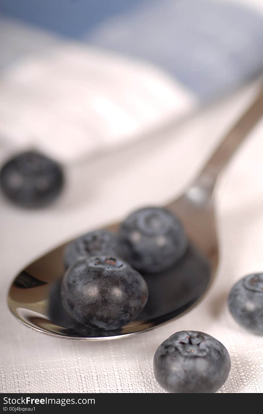 Blueberries Resting In A Spoon