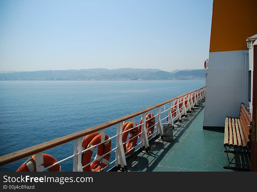 Deck of a ship carrying cars and passengers. Deck of a ship carrying cars and passengers