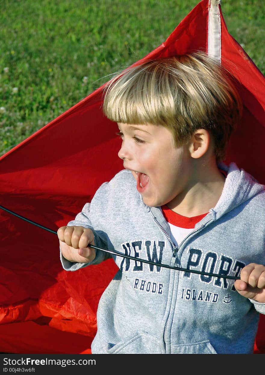 Boy Playing with Kite