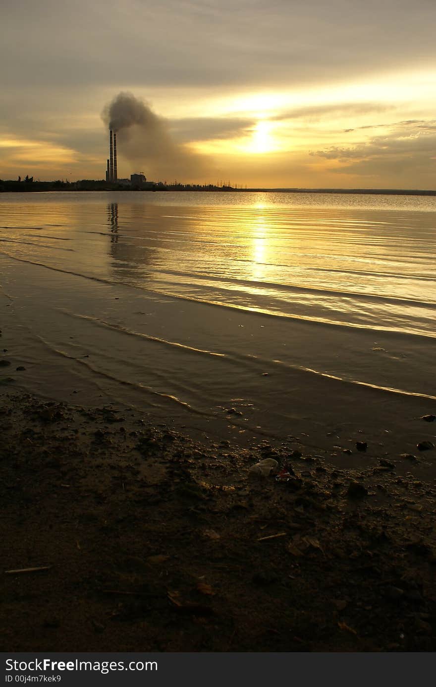 Thermal power plant in time of sunset