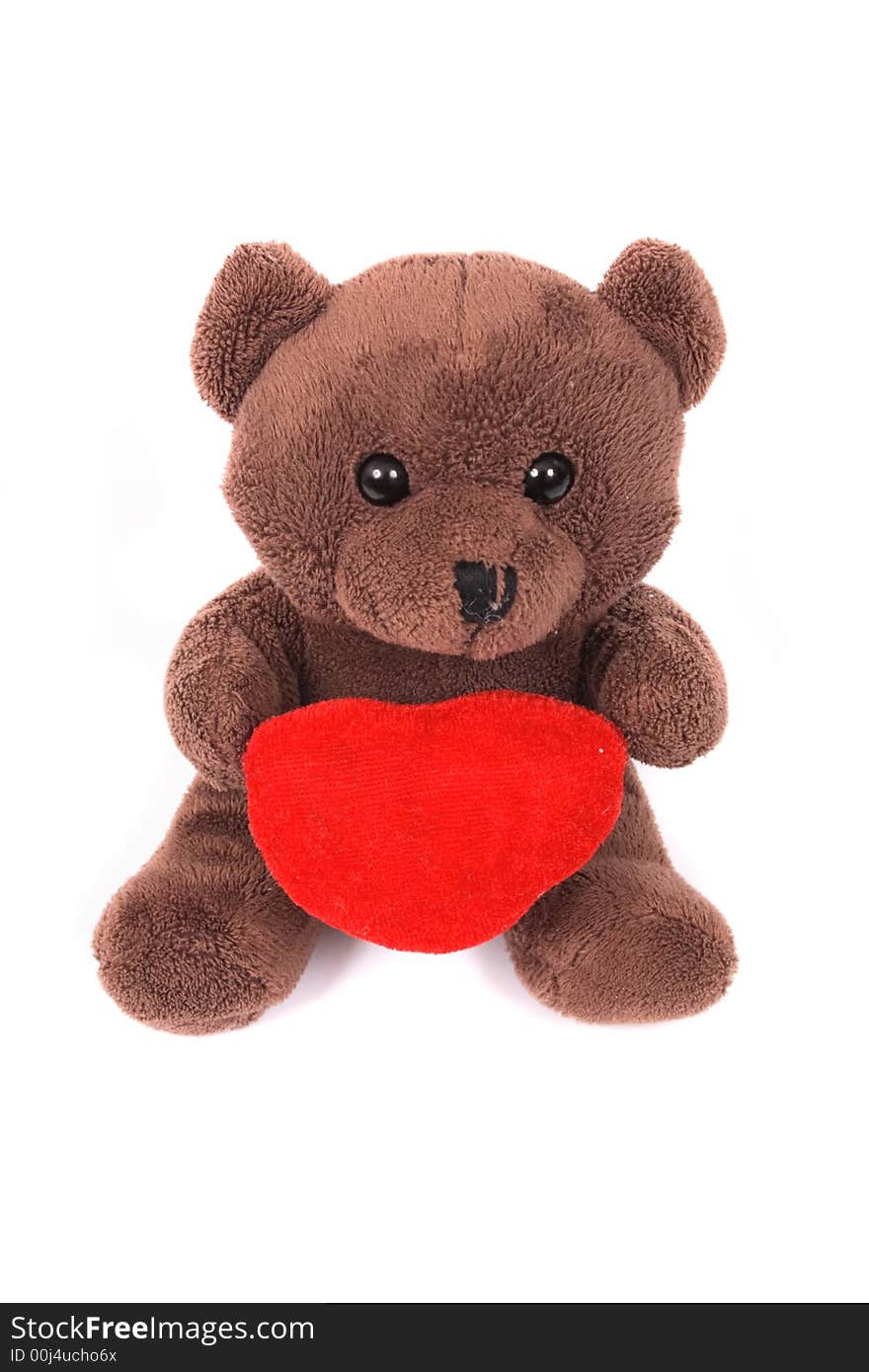 Toy bear with heart on the white background. Toy bear with heart on the white background