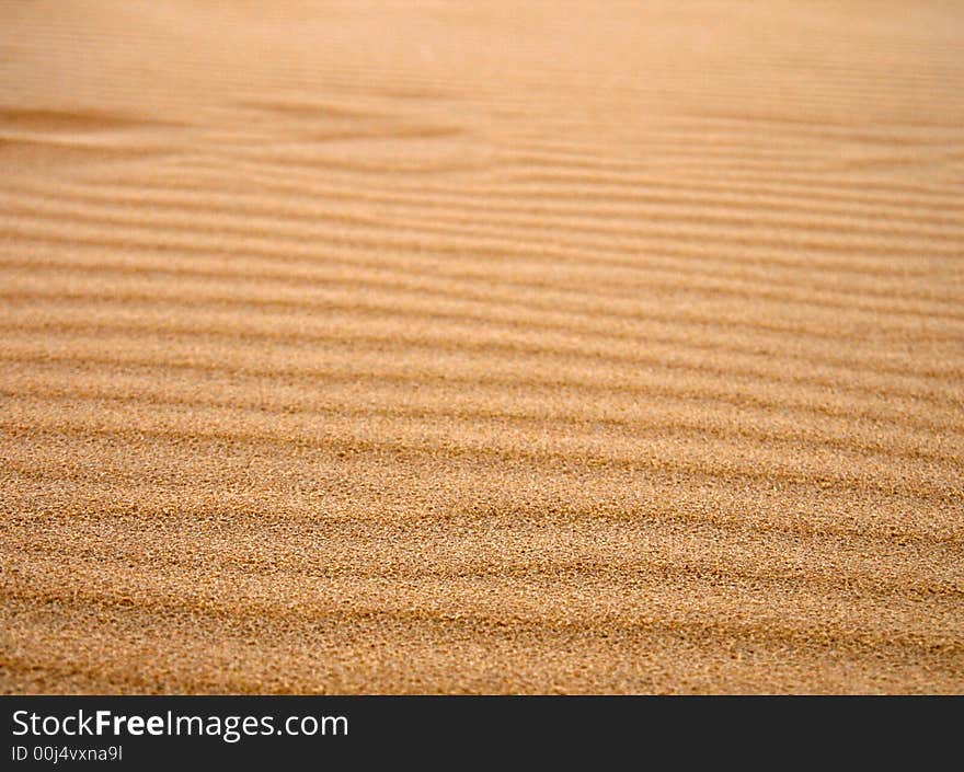 Dune sand texture, 
dark, gold sand