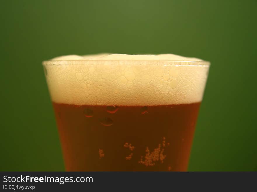 Drinking time... cold beer in summer time, focus on beer froth,. Drinking time... cold beer in summer time, focus on beer froth,