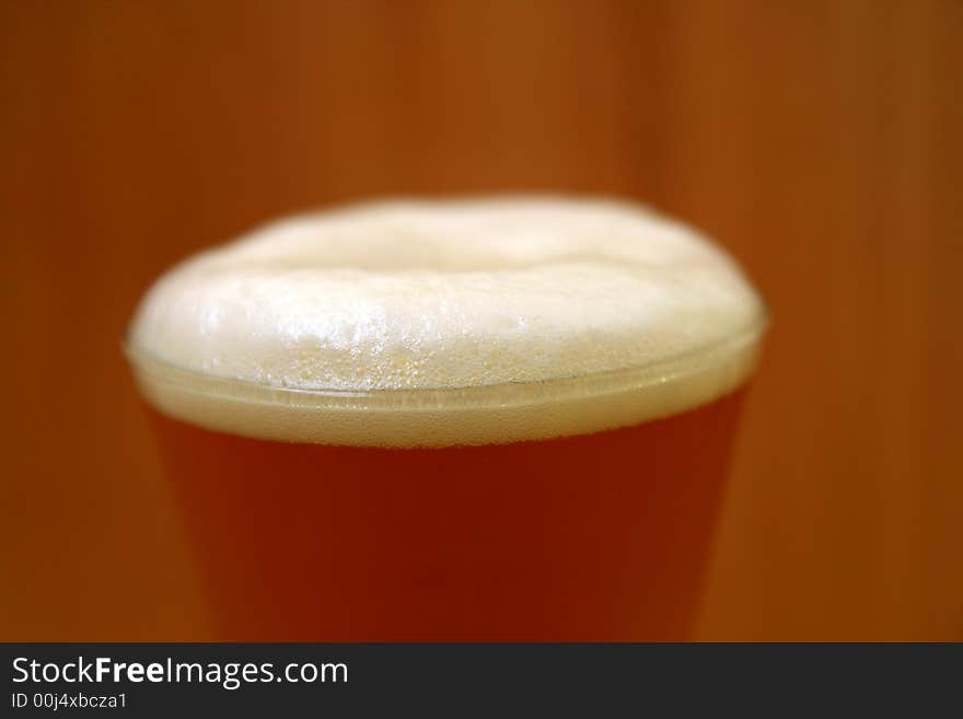 Drinking time... cold beer in summer time, focus on beer froth,. Drinking time... cold beer in summer time, focus on beer froth,