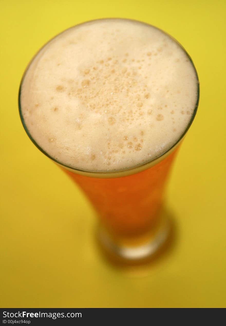 Drinking time... cold beer in summer time, focus on beer froth,. Drinking time... cold beer in summer time, focus on beer froth,