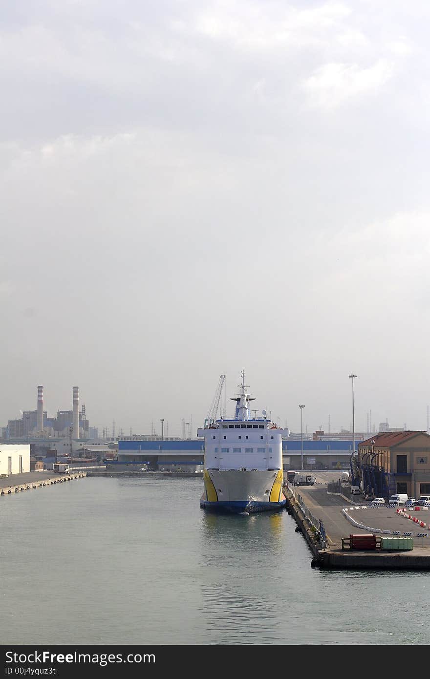 Ferry on dockside of harbor Livorno Italy