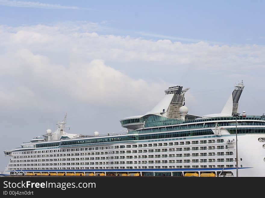 Passenger cruise ship on dock side