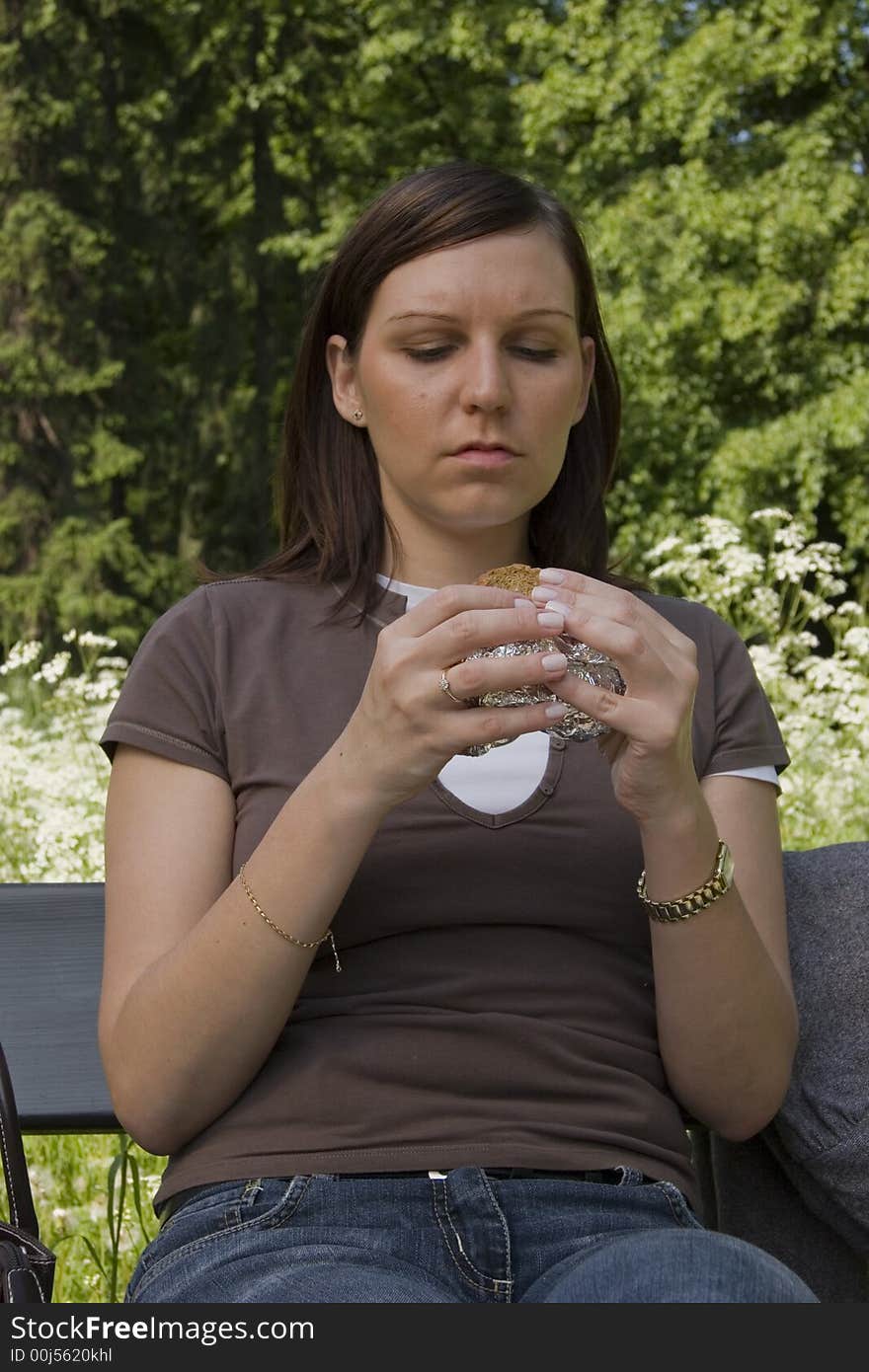 Business lunch in the park, young woman. Business lunch in the park, young woman