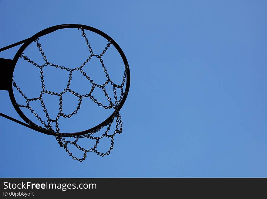 Shot of basketball hoop from the bottom up. Shot of basketball hoop from the bottom up