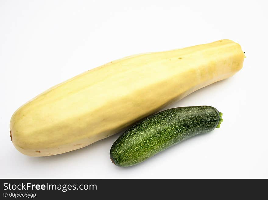 On a photo a vegetable marrow. The photo is isolated