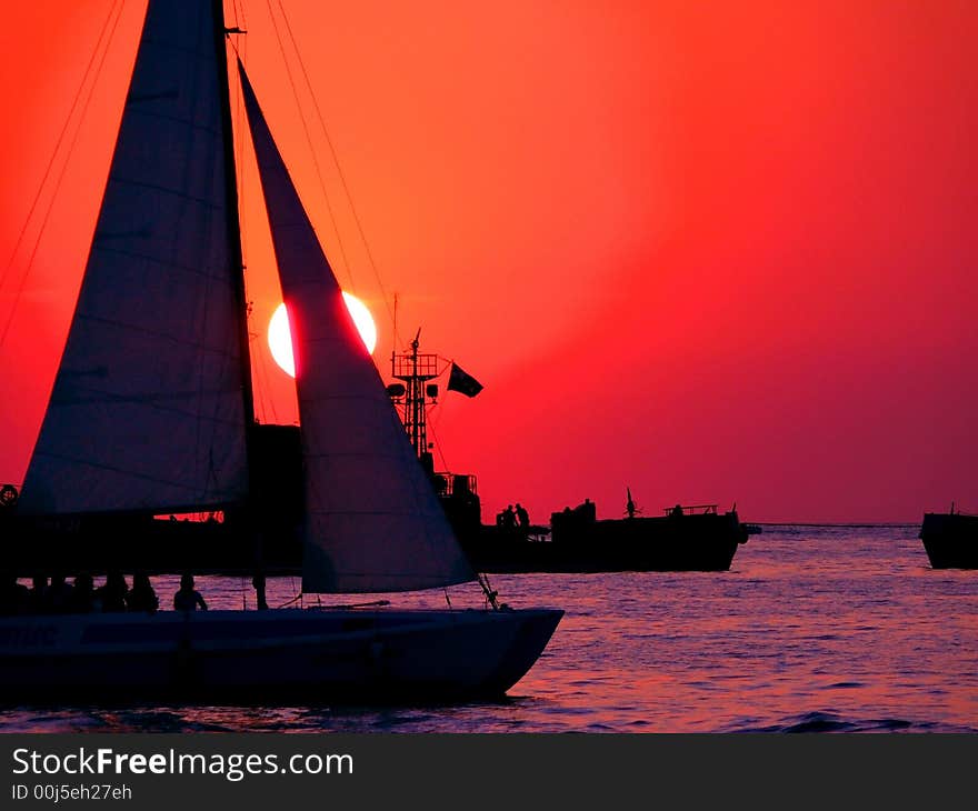 Yacht on a background a calling sun. Yacht on a background a calling sun