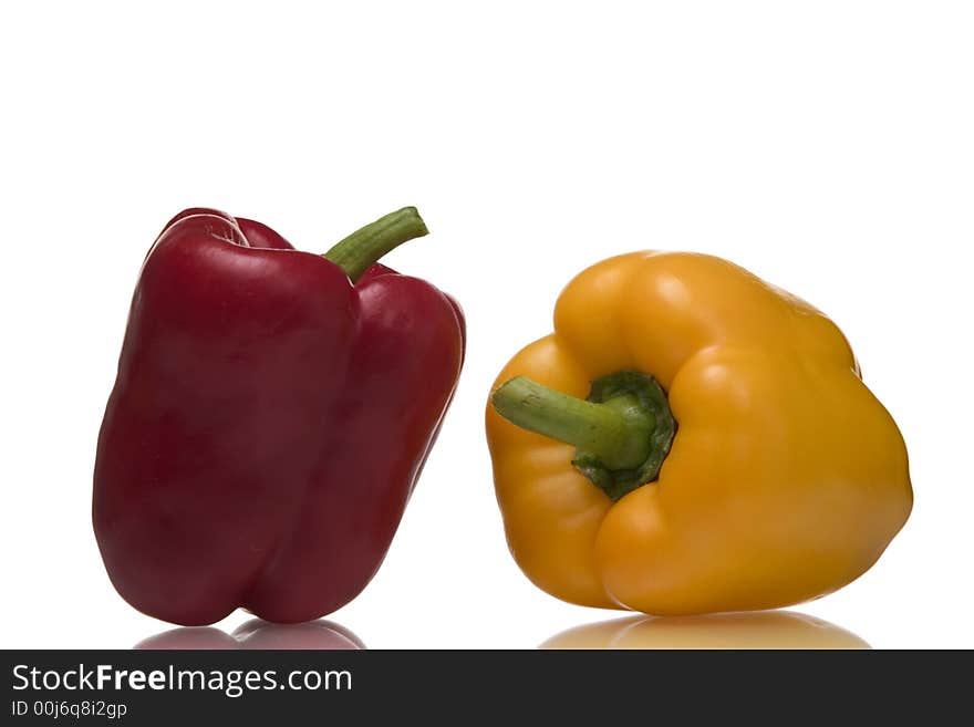 Colorful peppers isolated over white background