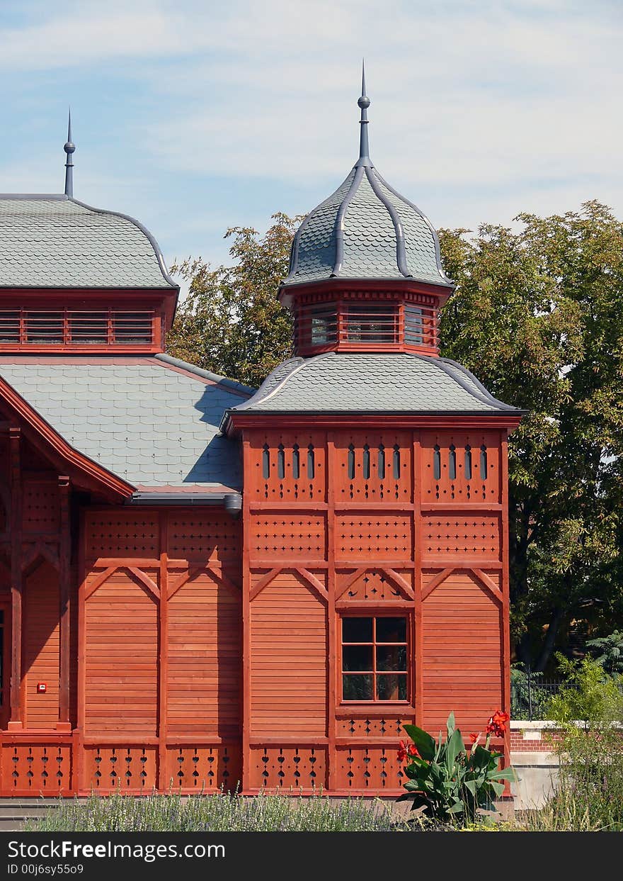 View side of the wooden house. View side of the wooden house