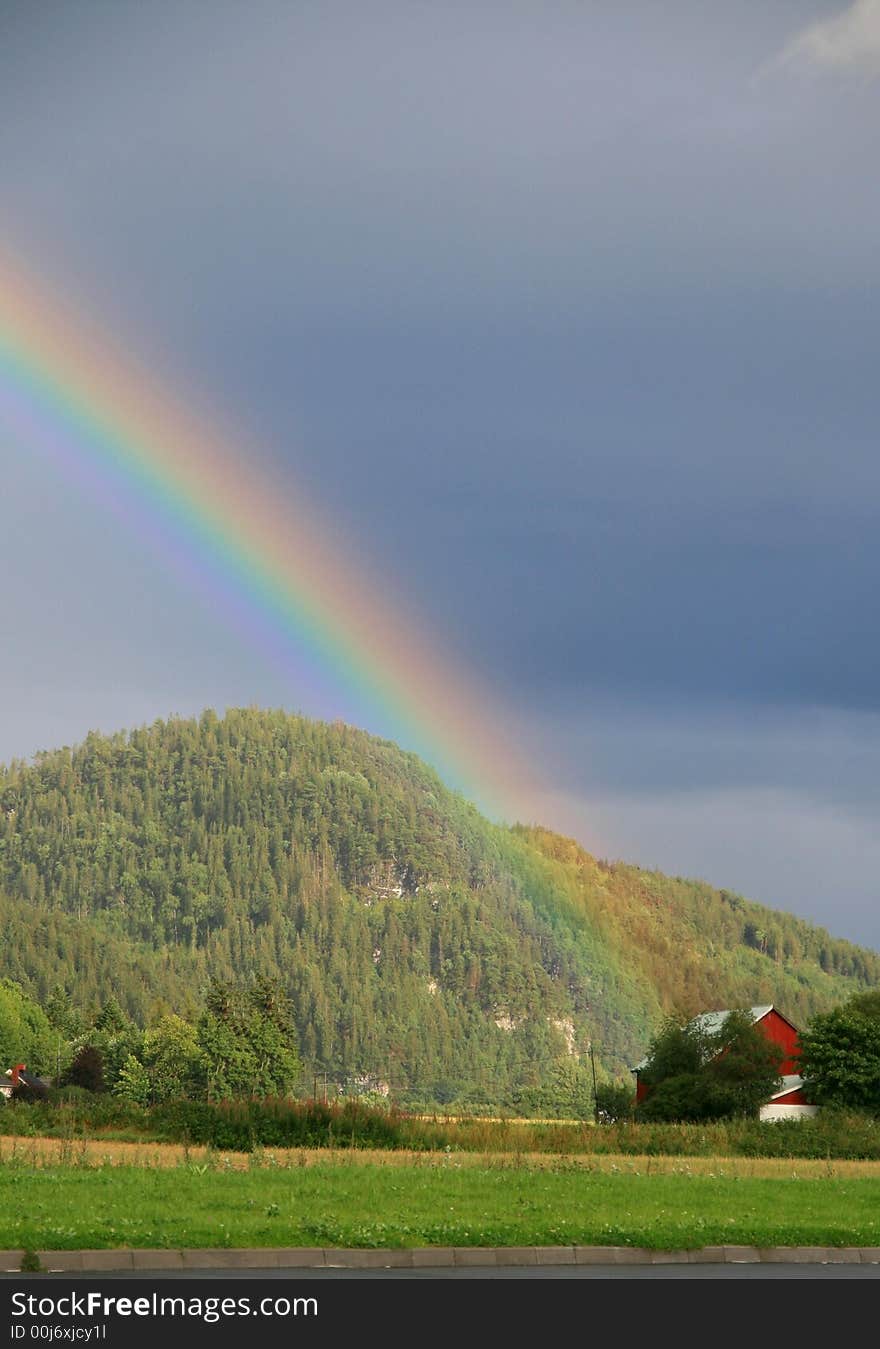 Rainbow over a summer landscape