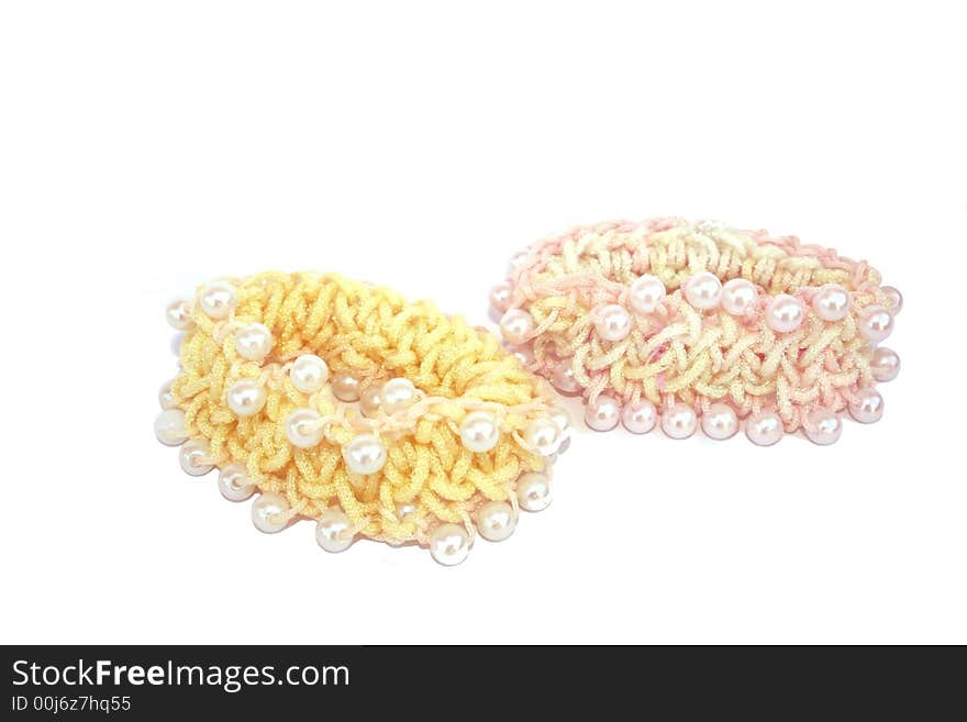 Hair elastics with perls isolated on the white.